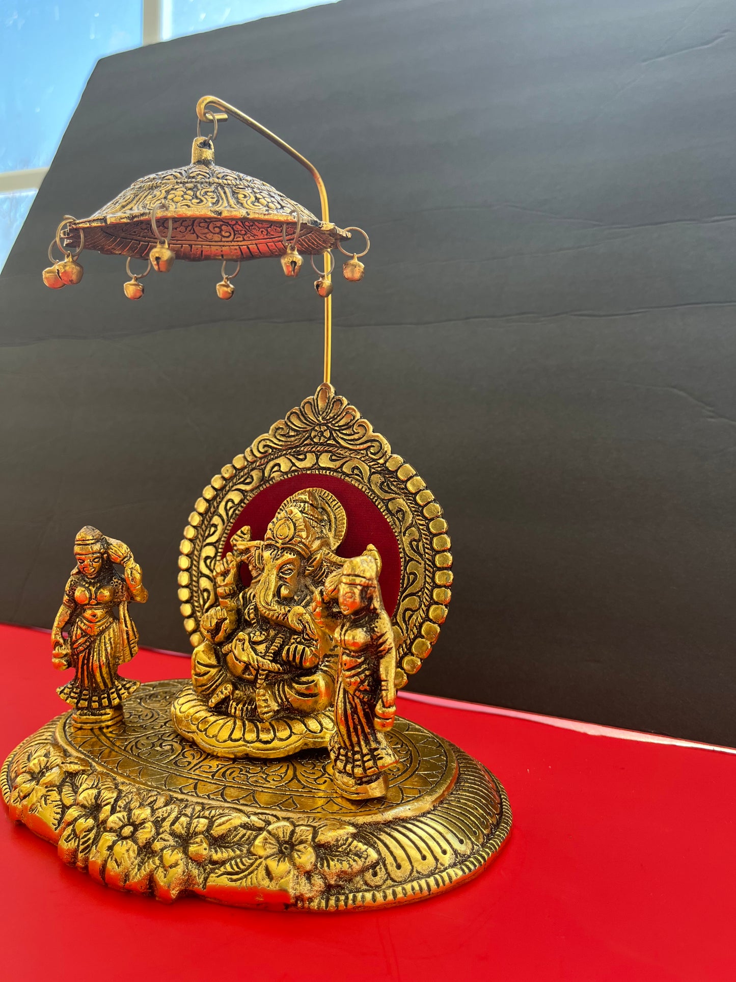 Oxidised Metal Sitting Lord Ganesh Under Umbrella with Goddess Ridhi and Sidhi Showpiece