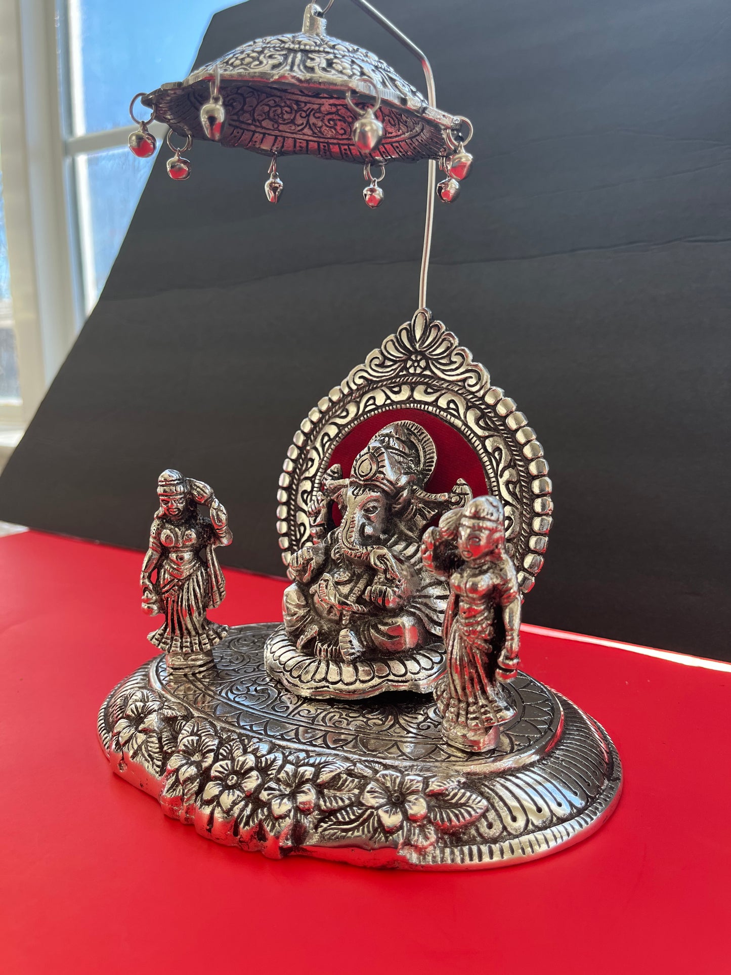 Oxidised Metal Sitting Lord Ganesh Under Umbrella with Goddess Ridhi and Sidhi Showpiece