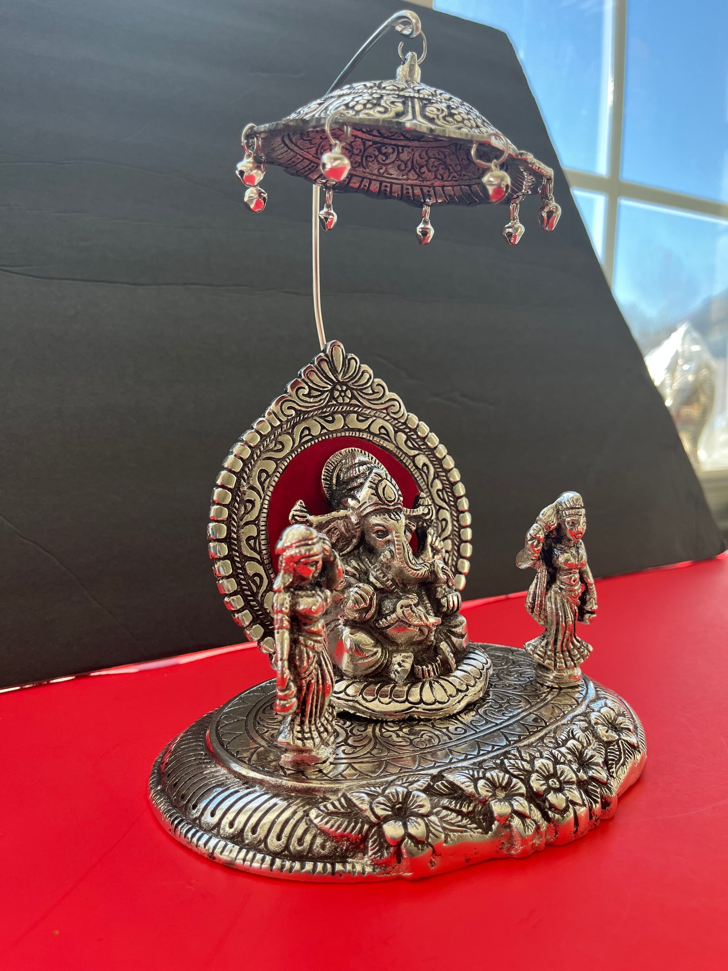 Oxidised Metal Sitting Lord Ganesh Under Umbrella with Goddess Ridhi and Sidhi Showpiece